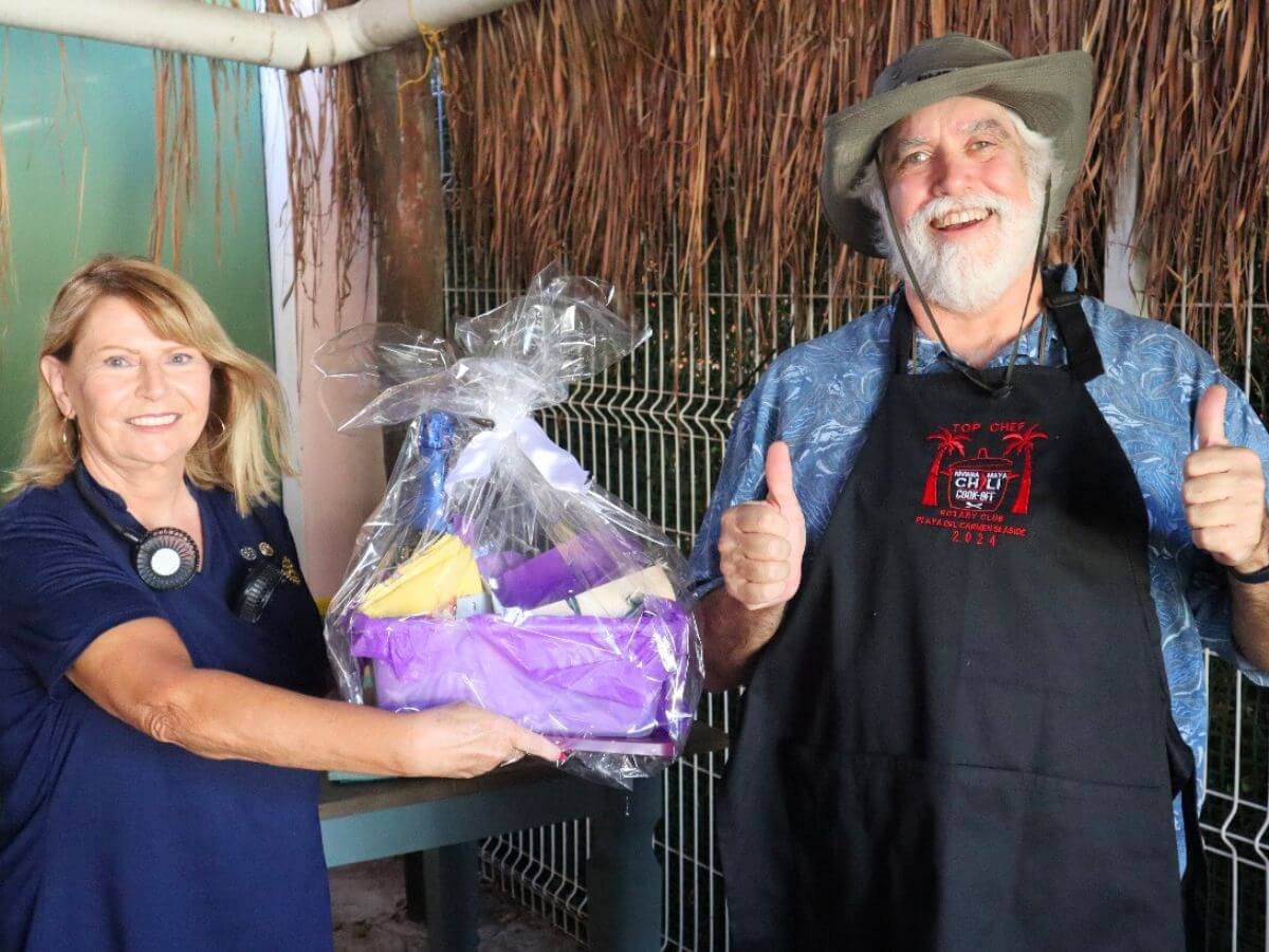 Winning Chef Michael Giller and Seaside Rotary Fundraising Co-Chair Teresa Cleaver