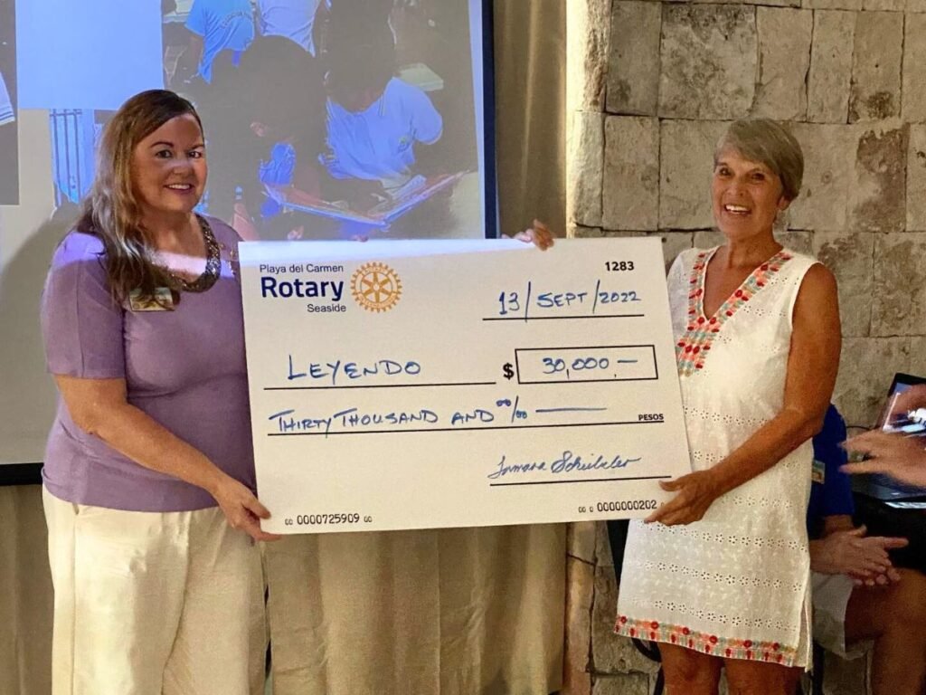 seaside rotary gives grant money to Leyendo